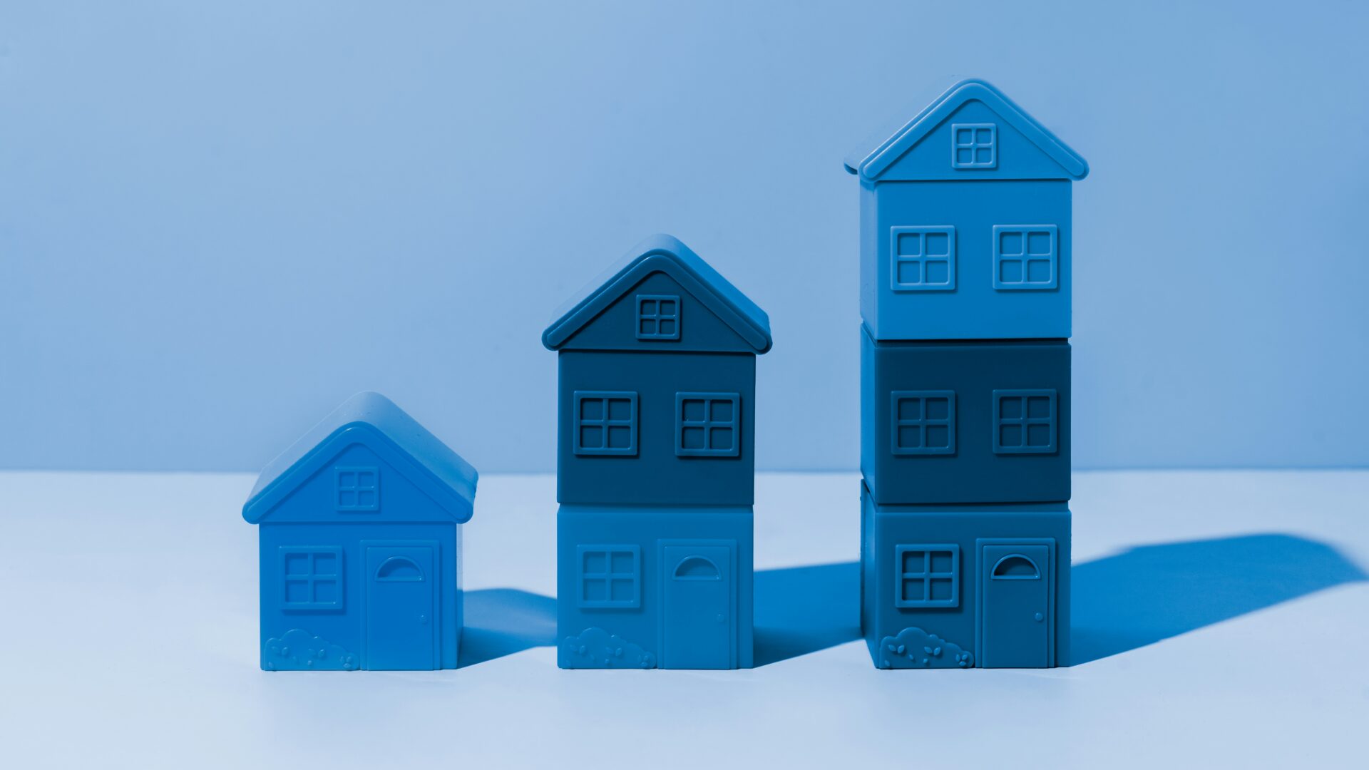 Infrastructure Property Investment Australia Growth Infrastructure property investment Australia - blue houses showing property value growth from government infrastructure spending
